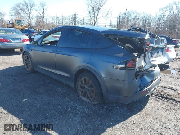 2022 Tesla Model X with VIN 7SAXCDE52NF345835, listed as a IAAI auction lot 41823522 with 24,401 mi miles and . Bid and sale history available at DreamBid. Image 3.