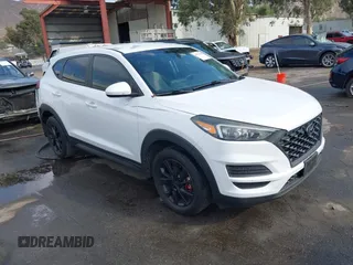 2020 Hyundai Tucson SE z VIN KM8J23A49LU077802, wystawiony jako IAAI lot #42779604 z przebiegiem 103 736 mil mil oraz . Historia ofert i sprzedaży dostępna na DreamBid. Obrazek 1.