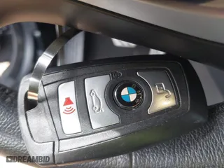 2014 BMW 4 Series 435i xDrive with VIN WBA3R5C54EK188957, listed as a IAAI auction lot 41790183 with 97,981 mi miles. Bid and sale history available at carsss.com. Image 11.