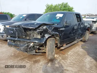 2014 Ford F-150 XL with VIN 1FTFW1CF1EKE20120, listed as a IAAI auction lot 42099294 with 207,198 mi miles and . Bid and sale history available at DreamBid. Image 2.