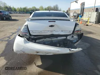 2013 Chevrolet Impala LTZ with VIN 2G1WC5E35D1173047, listed as a Copart auction lot 54965245 with 135,115 mi miles and Salvage Title. Bid and sale history available at DreamBid. Image 6.