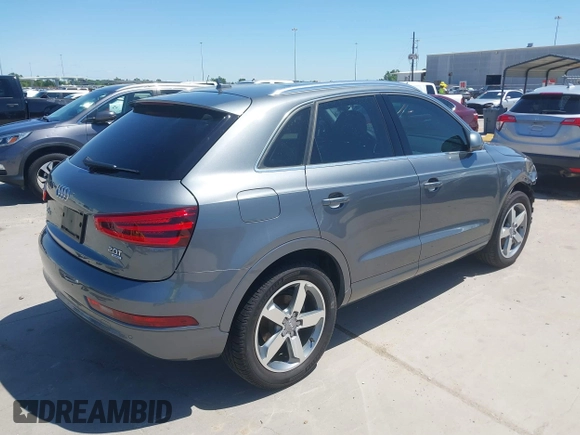 2015 Audi Q3 Prestige with VIN WA1GFCFS7FR013818, listed as a IAAI auction lot 41975076 with 60,295 mi miles and . Bid and sale history available at DreamBid. Image 4.