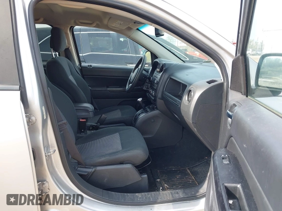 2013 Jeep Compass Sport with VIN 1C4NJDBB4DD119077, listed as a IAAI auction lot 42142532 with 131,679 mi miles. Bid and sale history available at carsss.com. Image 5.