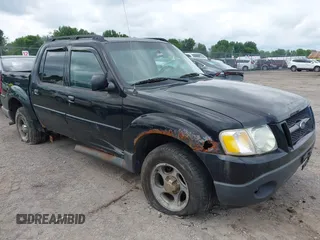 2004 Ford Explorer Sport Trac XLS with VIN 1FMZU77K64UA21537, listed as a IAAI auction lot 42697234 with 177,944 mi miles and . Bid and sale history available at DreamBid. Image 1.