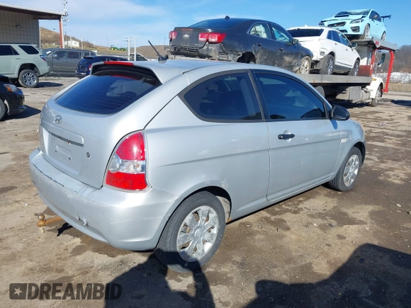 2007 Hyundai Accent GS with VIN KMHCM36C97U043769, listed as a IAAI auction lot 41526011 with 230,566 mi miles. Bid and sale history available at carsss.com. Image 4.