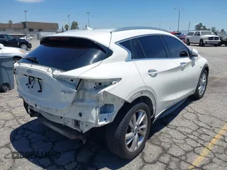 2018 Infiniti QX30 Premium z VIN SJKCH5CP5JA006199, wystawiony jako IAAI lot #42673215 z przebiegiem 107 294 mil mil oraz . Historia ofert i sprzedaży dostępna na DreamBid. Obrazek 4.