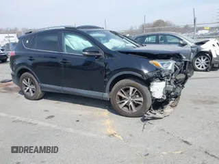 2018 Toyota RAV4 XLE with VIN 2T3RFREV6JW734993, listed as a IAAI auction lot 41790232 with 61,118 mi miles. Bid and sale history available at carsss.com. Image 1.