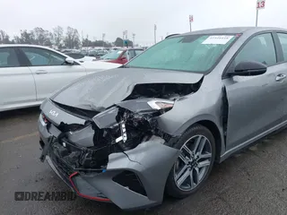 2023 Kia Forte GT-Line z VIN 3KPF54AD8PE602683, wystawiony jako IAAI lot #41444418 z przebiegiem 52 229 mil mil oraz . Historia ofert i sprzedaży dostępna na DreamBid. Obrazek 6.