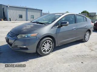 2011 Honda Insight EX с VIN JHMZE2H72BS010167, выставлен на аукционе Copart как лот 66837405 с пробегом 259 432 миль миль и Чистый • Clean title. История ставок и продаж доступна на DreamBid. Изображение 1.