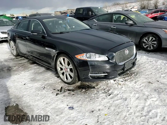 2015 Jaguar XJ Portfolio z VIN SAJWJ2GD4F8V79582, wystawiony jako Copart lot #42121395 z przebiegiem 65 017 mil mil oraz Szkoda całkowita • Salvage title. Historia ofert i sprzedaży dostępna na DreamBid. Obrazek 13.