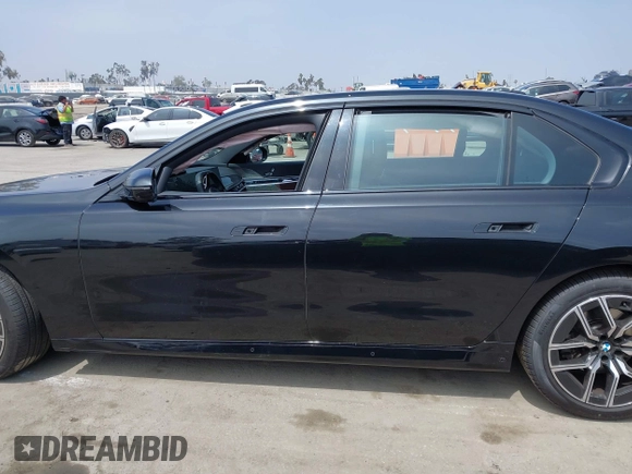 2023 BMW 7 Series 740i with VIN WBA23EH02PCM14257, listed as a IAAI auction lot 42408167 with Not provided miles and . Bid and sale history available at DreamBid. Image 14.