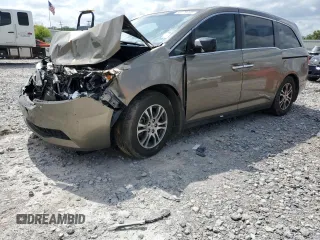 2013 Honda Odyssey EX-L with VIN 5FNRL5H64DB039329, listed as a Copart auction lot 59176465 with 181,126 mi miles and Salvage title. Bid and sale history available at DreamBid. Image 1.
