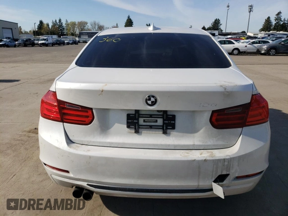 2012 BMW 3 Series 328i with VIN WBA3C1C5XCA696847, listed as a Copart auction lot 53005425 with 143,725 mi miles and Salvage title. Bid and sale history available at DreamBid. Image 6.