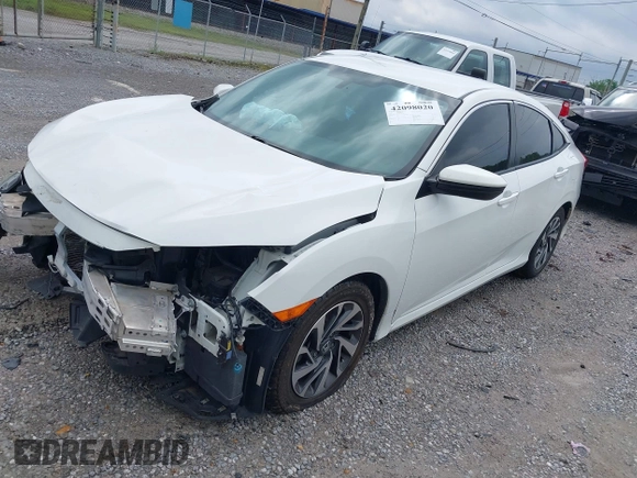 2018 Honda Civic LX with VIN 2HGFC2F59JH576975, listed as a IAAI auction lot 42098020 with 89,791 mi miles and . Bid and sale history available at DreamBid. Image 18.