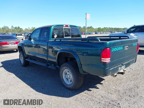 1998 Dodge Dakota SLT with VIN 1B7GG22Y0WS524464, listed as a IAAI auction lot 41806151 with 185,380 mi miles. Bid and sale history available at carsss.com. Image 3.