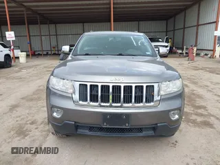 2013 Jeep Grand Cherokee Laredo with VIN 1C4RJEAG2DC571569, listed as a IAAI auction lot 41100518 with 98,265 mi miles. Bid and sale history available at carsss.com. Image 12.