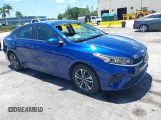 2023 Kia Forte LXS z VIN 3KPF24AD7PE690912, wystawiony jako IAAI lot #42511870 z przebiegiem 36 868 mil mil oraz . Historia ofert i sprzedaży dostępna na DreamBid. Obrazek 1.
