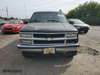 1999 Chevrolet Tahoe Z71 with VIN 1GNEK13R6XJ411348, listed as a Copart auction lot 71179204 with 162,752 mi miles and Salvage Title. Bid and sale history available at carsss.com. Image 5.