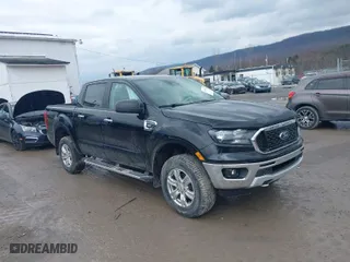 2021 Ford Ranger XL with VIN 1FTER4FH6MLD42153, listed as a IAAI auction lot 41650522 with 77156 miles. Bid and sale history available at carsss.com. Image 1.