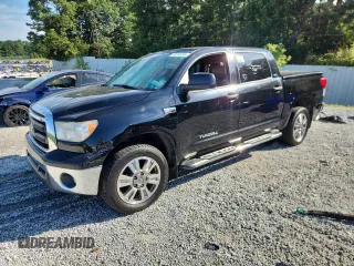 2013 Toyota Tundra with VIN 5TFEY5F14DX142974, listed as a Copart auction lot 63593345 with 332,266 mi miles and Clean title. Bid and sale history available at DreamBid. Image 1.