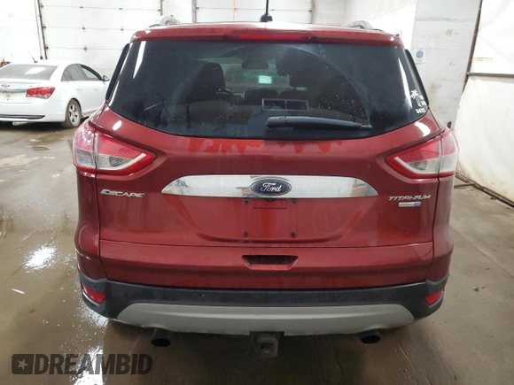 2016 Ford Escape Titanium with VIN 1FMCU9J95GUC57205, listed as a Copart auction lot 71033934 with 90,477 mi miles and Salvage Title. Bid and sale history available at DreamBid. Image 6.