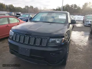 2021 Jeep Grand Cherokee Laredo X with VIN 1C4RJFAG6MC599672, listed as a IAAI auction lot 41323741 with 71,491 mi miles. Bid and sale history available at carsss.com. Image 2.