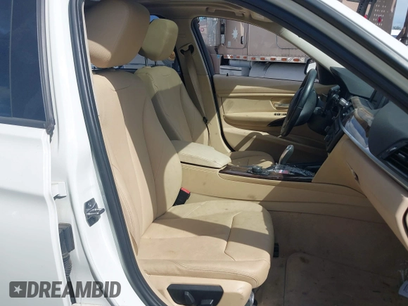 2015 BMW 3 Series 320i xDrive with VIN WBA3C3C58FK201748, listed as a IAAI auction lot 42678404 with 115,043 mi miles and . Bid and sale history available at DreamBid. Image 5.