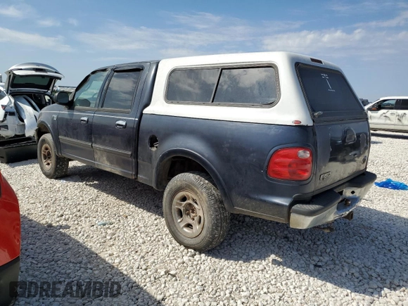 2001 Ford F-150 XLT with VIN 1FTRW08W41KF57904, listed as a Copart auction lot 47250035 with 185,985 mi miles and Clean title. Bid and sale history available at DreamBid. Image 2.