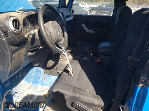 2011 Jeep Wrangler Rubicon with VIN 1J4BA6D15BL563410, listed as a Copart auction lot 76973964 with 68,334 mi miles and Salvage title. Bid and sale history available at DreamBid. Image 7.