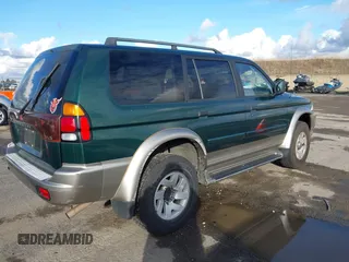 2001 Mitsubishi Montero Sport XLS with VIN JA4LS31HX1P005173, listed as a IAAI auction lot 40979545 with 147,168 mi miles. Bid and sale history available at carsss.com. Image 4.