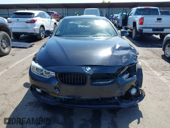 2014 BMW 4 Series 428i xDrive with VIN WBA3N9C53EK244907, listed as a IAAI auction lot 42380025 with 71,431 mi miles and . Bid and sale history available at DreamBid. Image 12.