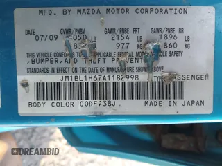 2010 Mazda 3 S Sport with VIN JM1BL1H67A1182998, listed as a IAAI auction lot 42215035 with 212,422 mi miles and . Bid and sale history available at DreamBid. Image 9.