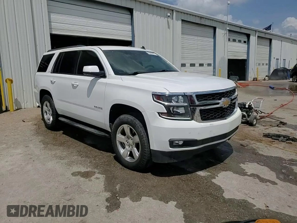 2015 Chevrolet Tahoe LT with VIN 1GNSCBKC8FR181394, listed as a Copart auction lot 53846435 with 191,875 mi miles and Salvage title. Bid and sale history available at DreamBid. Image 14.