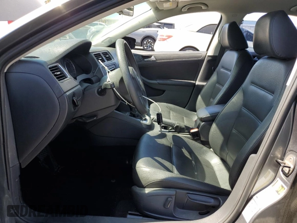 2014 Volkswagen Jetta SE with VIN 3VWD17AJ2EM322087, listed as a Copart auction lot 62571155 with 71,884 mi miles and Salvage title. Bid and sale history available at DreamBid. Image 7.