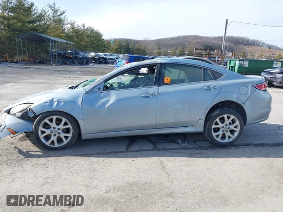 2009 Mazda 6 S Grand Touring with VIN 1YVHP82B595M21363, listed as a IAAI auction lot 41521753 with 135,000 mi miles and . Bid and sale history available at DreamBid. Image 14.