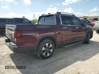 2019 Honda Ridgeline RTL-E with VIN 5FPYK3F71KB002046, listed as a Copart auction lot 61934455 with 131,674 mi miles and Salvage title. Bid and sale history available at DreamBid. Image 3.
