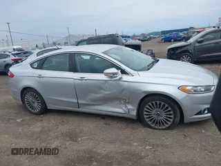 2016 Ford Fusion Titanium with VIN 3FA6P0K93GR117587, listed as a IAAI auction lot 42079701 with 142,105 mi miles. Bid and sale history available at carsss.com. Image 13.