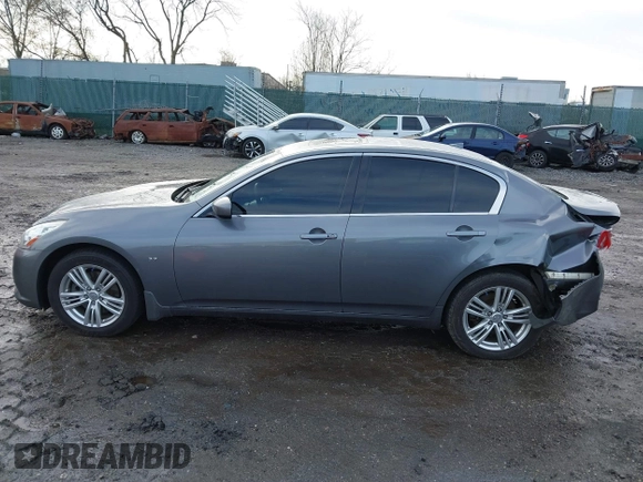 2015 Infiniti Q40 with VIN JN1CV6AR1FM520601, listed as a IAAI auction lot 41854014 with 157,684 mi miles and . Bid and sale history available at DreamBid. Image 14.