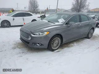 2014 Ford Fusion Titanium with VIN 3FA6P0K94ER320436, listed as a IAAI auction lot 41568918 with 183,040 mi miles. Bid and sale history available at carsss.com. Image 2.
