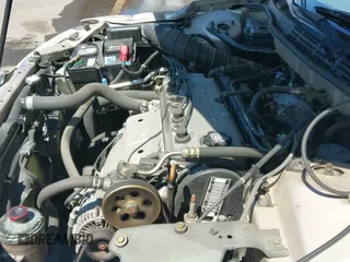 2000 Honda Accord LX z VIN JHMCG5646YC039765, wystawiony jako IAAI lot #42628641 z przebiegiem 144 722 mil mil oraz . Historia ofert i sprzedaży dostępna na DreamBid. Obrazek 19.