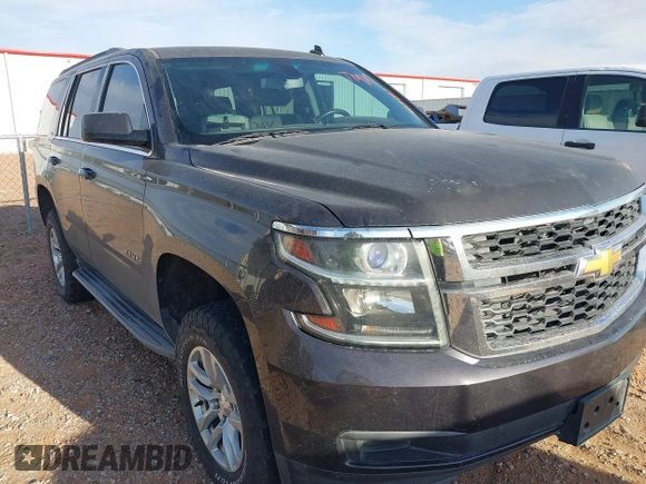 2015 Chevrolet Tahoe LS with VIN 1GNSCAKC9FR122896, listed as a IAAI auction lot 42239812 with 164,888 mi miles and . Bid and sale history available at DreamBid. Image 6.