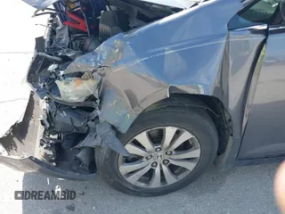 2016 Honda Odyssey EX-L with VIN 5FNRL5H69GB129807, listed as a IAAI auction lot 41973832 with 181,686 mi miles. Bid and sale history available at carsss.com. Image 6.