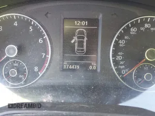 2013 Volkswagen Passat SE z VIN 1VWBP7A34DC075453, wystawiony jako IAAI lot #42315237 z przebiegiem 174 479 mil mil oraz . Historia ofert i sprzedaży dostępna na DreamBid. Obrazek 7.