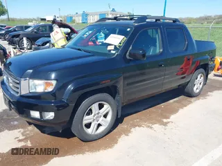 2013 Honda Ridgeline RTL with VIN 5FPYK1F57DB005538, listed as a IAAI auction lot 41985586 with 152,697 mi miles and . Bid and sale history available at DreamBid. Image 2.