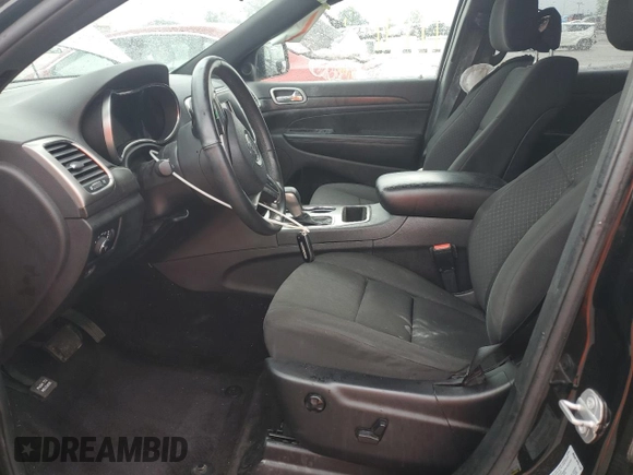 2018 Jeep Grand Cherokee Laredo E with VIN 1C4RJFAG5JC113283, listed as a Copart auction lot 57569595 with 90,897 mi miles and Salvage title. Bid and sale history available at DreamBid. Image 7.