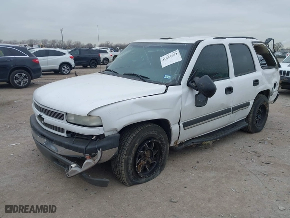2004 Chevrolet Tahoe LT with VIN 1GNEC13Z74R313844, listed as a IAAI auction lot 41444672 with 233,620 mi miles. Bid and sale history available at carsss.com. Image 2.