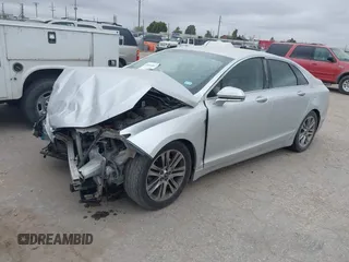 2013 Lincoln MKZ z VIN 3LN6L2G90DR826978, wystawiony jako IAAI lot #40630089 z przebiegiem Nie podano mil oraz . Historia ofert i sprzedaży dostępna na DreamBid. Obrazek 2.
