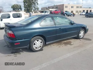 1997 Honda Accord EX w/Leather with VIN 1HGCD7158VA014025, listed as a IAAI auction lot 41582343 with 302,660 mi miles. Bid and sale history available at carsss.com. Image 4.