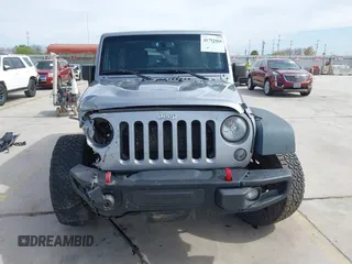2015 Jeep Wrangler Unlimited Rubicon Hard Rock с VIN 1C4HJWFG6FL762537, выставлен на аукционе IAAI как лот 41792066 с пробегом 125 829 миль миль и . История ставок и продаж доступна на DreamBid. Изображение 12.