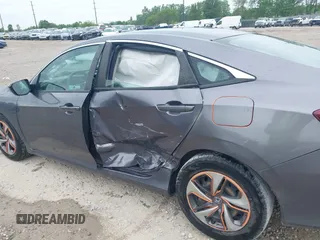 2020 Honda Civic LX z VIN 19XFC2F66LE012481, wystawiony jako IAAI lot #42297600 z przebiegiem 56 602 mil mil oraz . Historia ofert i sprzedaży dostępna na DreamBid. Obrazek 6.